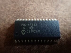 crack locked PIC16F882 MCU tamper resistance system and decrypt embedded firmware of binary program or eeprom data from secured microcontroller PIC16F882 flash memory or eeprom memory, extract source code of protective PIC16F882 microprocessor;